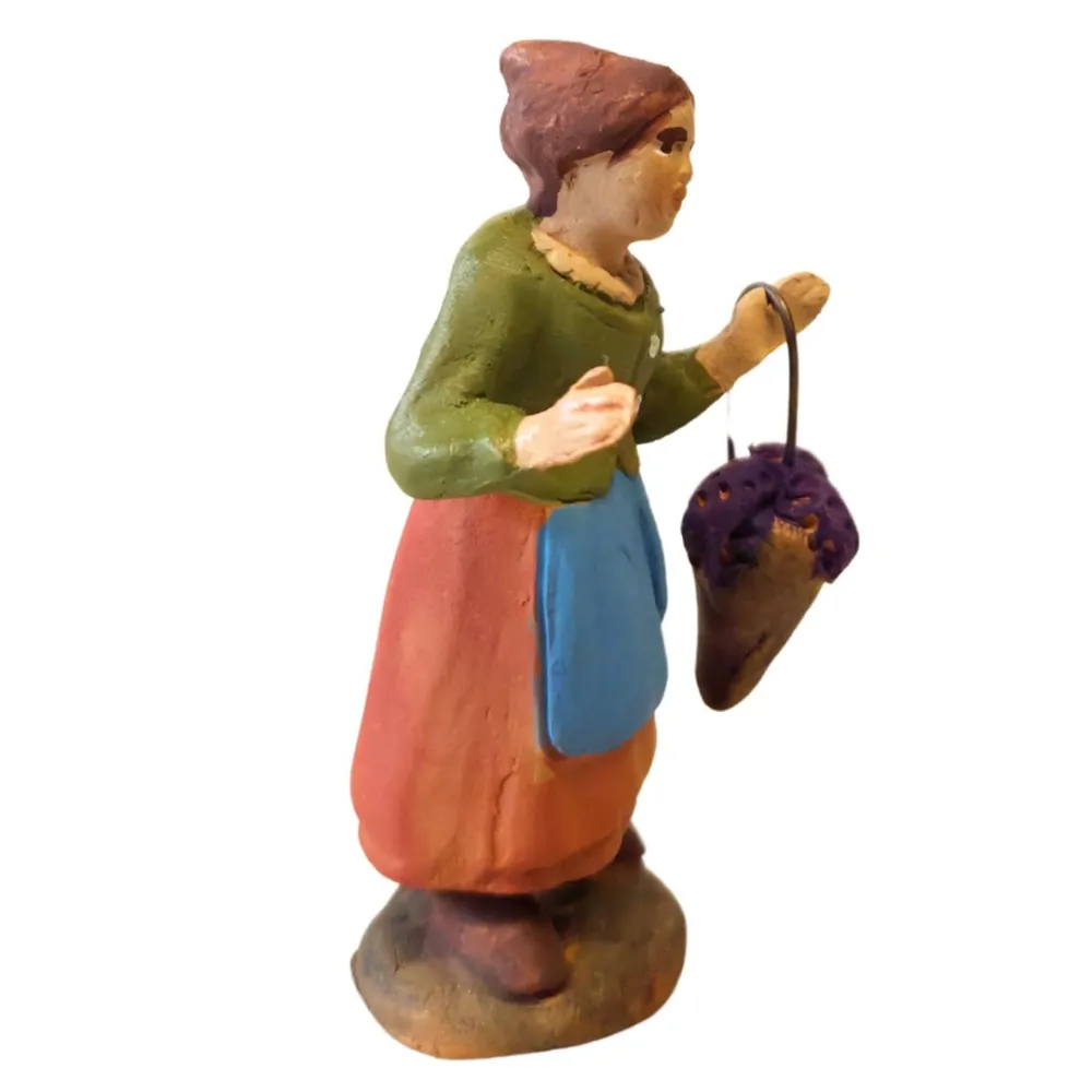 Donna con cesto uva in terracotta 7 cm