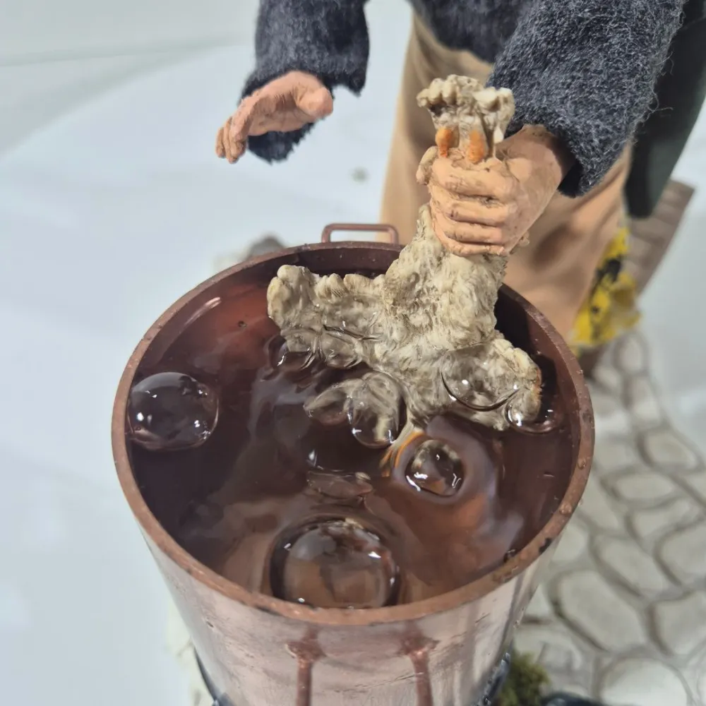 Animated Traditional Woman Plucking a Chicken - 30 cm