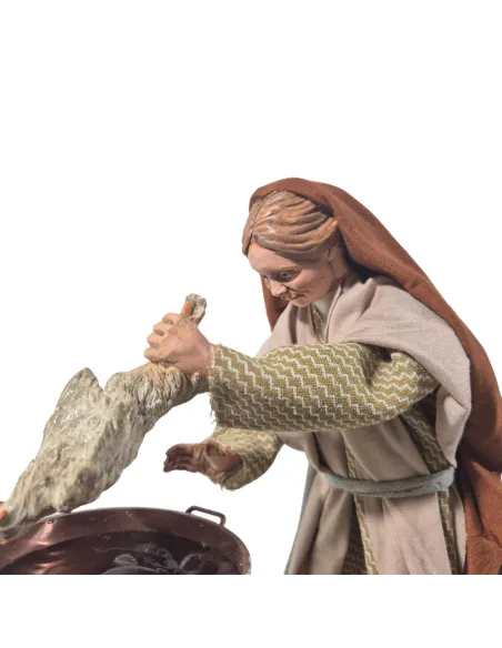 Donna che spenna il pollo palestinese in movimento 30 cm