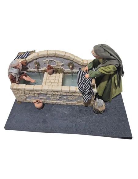 Fonte con lavandaia e bambino palestinesi in movimento 30 cm
