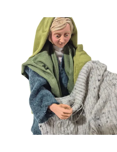 Donna che rammenda palestinese in movimento 30 cm