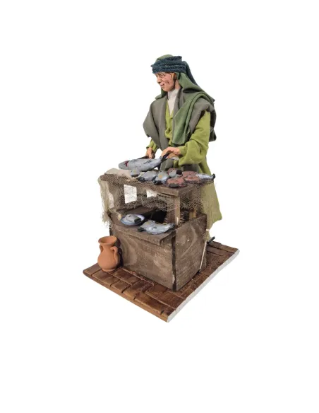 Pescivendolo palestinese pulisce pesce in movimento 30 cm