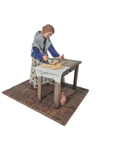 Donna che affetta il pane popolare in movimento 30 cm