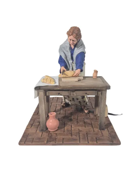 Donna che affetta il pane popolare in movimento 30 cm