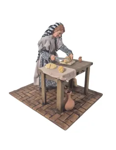 Donna che affetta il pane palestinese in movimento 30 cm