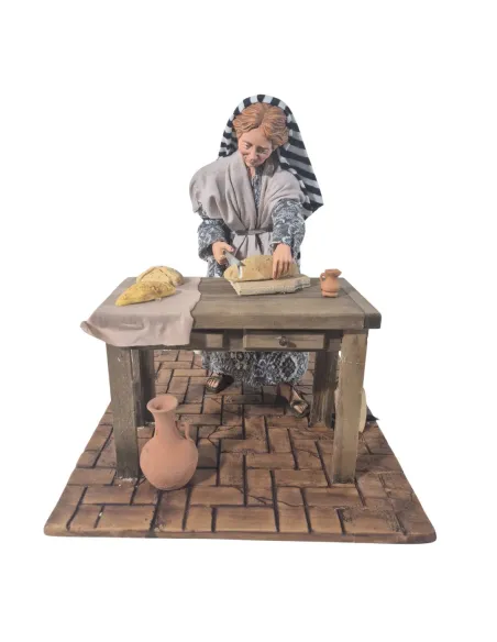 Donna che affetta il pane palestinese in movimento 30 cm