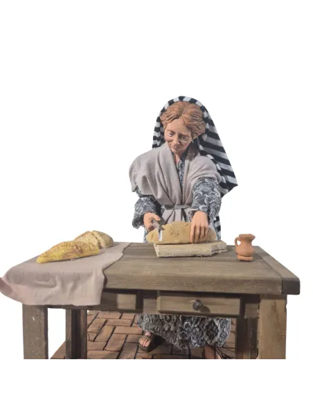 Donna che affetta il pane palestinese in movimento 30 cm