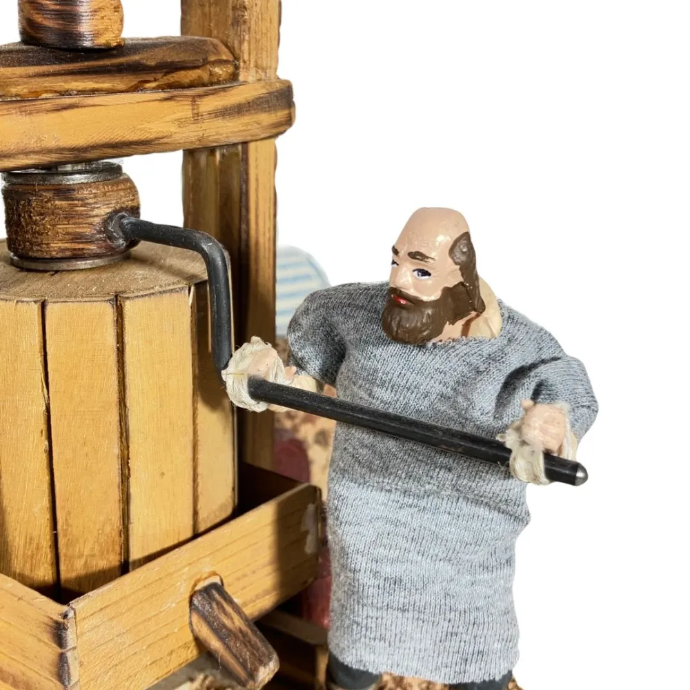 Animated 10 cm Oliver Man Operating a Traditional Press
