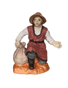 Contadino inginocchiato Oliver 8 cm con sacco