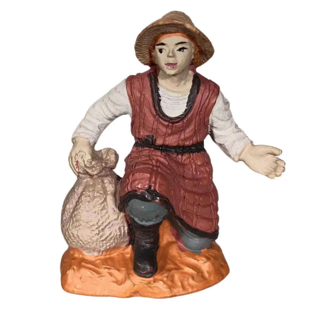 Contadino inginocchiato Oliver 8 cm con sacco