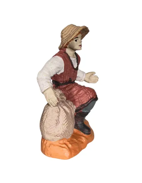 Contadino inginocchiato Oliver 8 cm con sacco