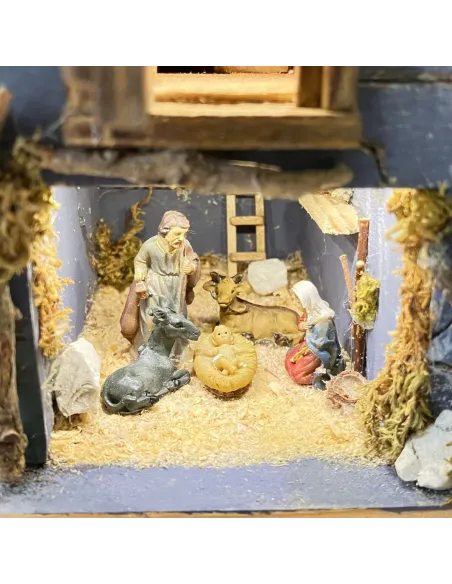 Presepe su cassetta vino con luci e fuoco con statue da 3,5 cm
