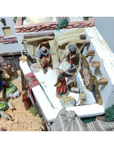 Presepe con 8 movimenti ed acqua in legno e sughero con statue da 10 cm