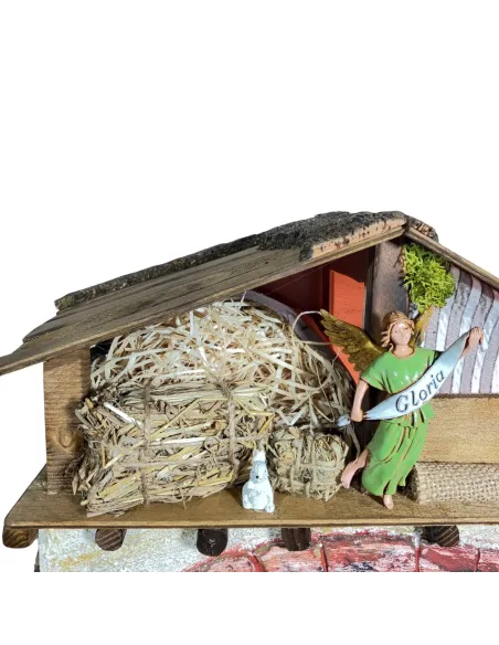 Presepe su fienile in legno, gesso e sughero con luci e statue da 10 cm