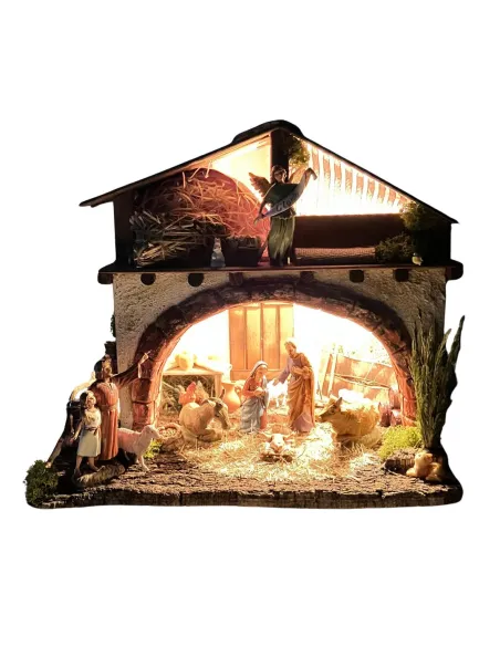 Presepe su fienile in legno, gesso e sughero con luci e statue da 10 cm