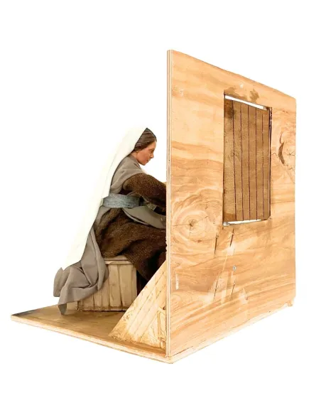 Donna che culla bambino in movimento 30 cm