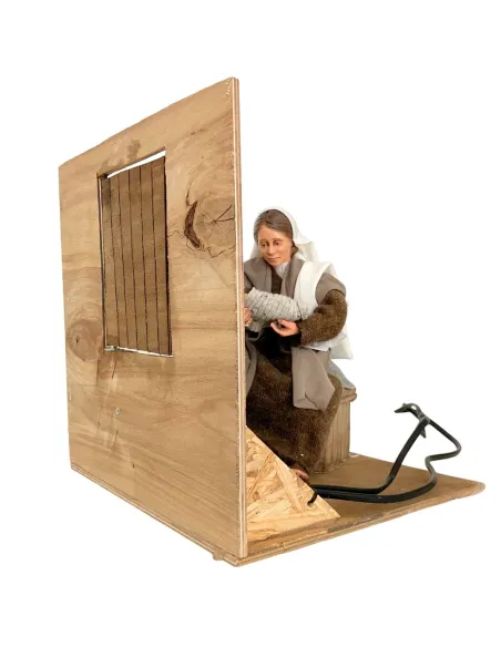 Donna che culla bambino in movimento 30 cm