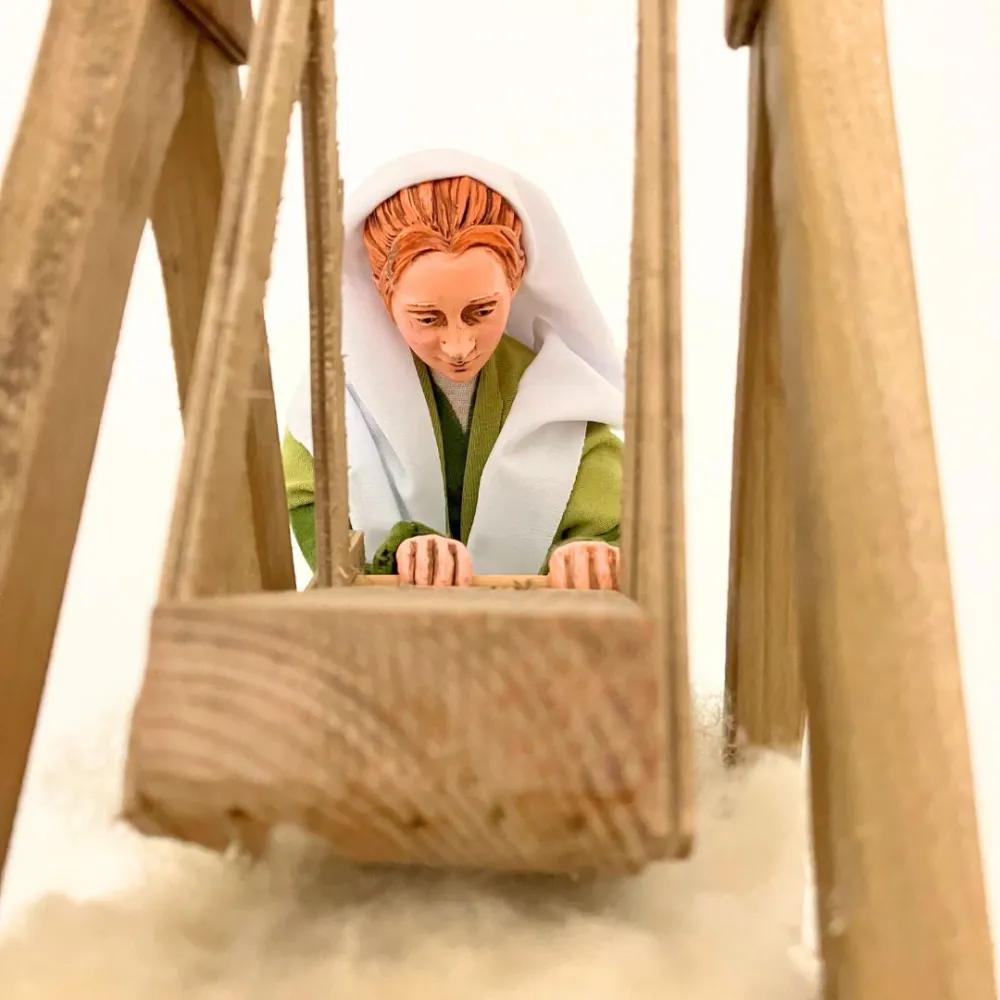 Animated Palestinian Woman Carding Wool - 30 cm