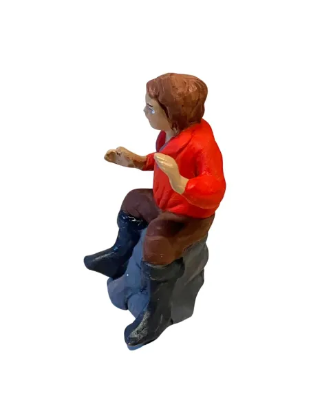 Uomo seduto in terracotta 7 cm