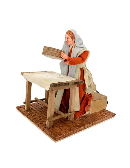 Donna che setaccia la farina palestinese 30 cm in movimento