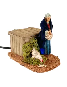 Donna Landi che ciba gallina in movimento 12 cm