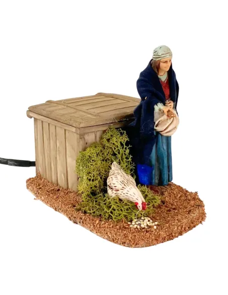 Donna Landi che ciba gallina in movimento 12 cm