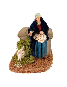 Donna Landi che ciba gallina in movimento 12 cm 2