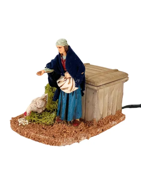 Donna Landi che ciba gallina in movimento 12 cm