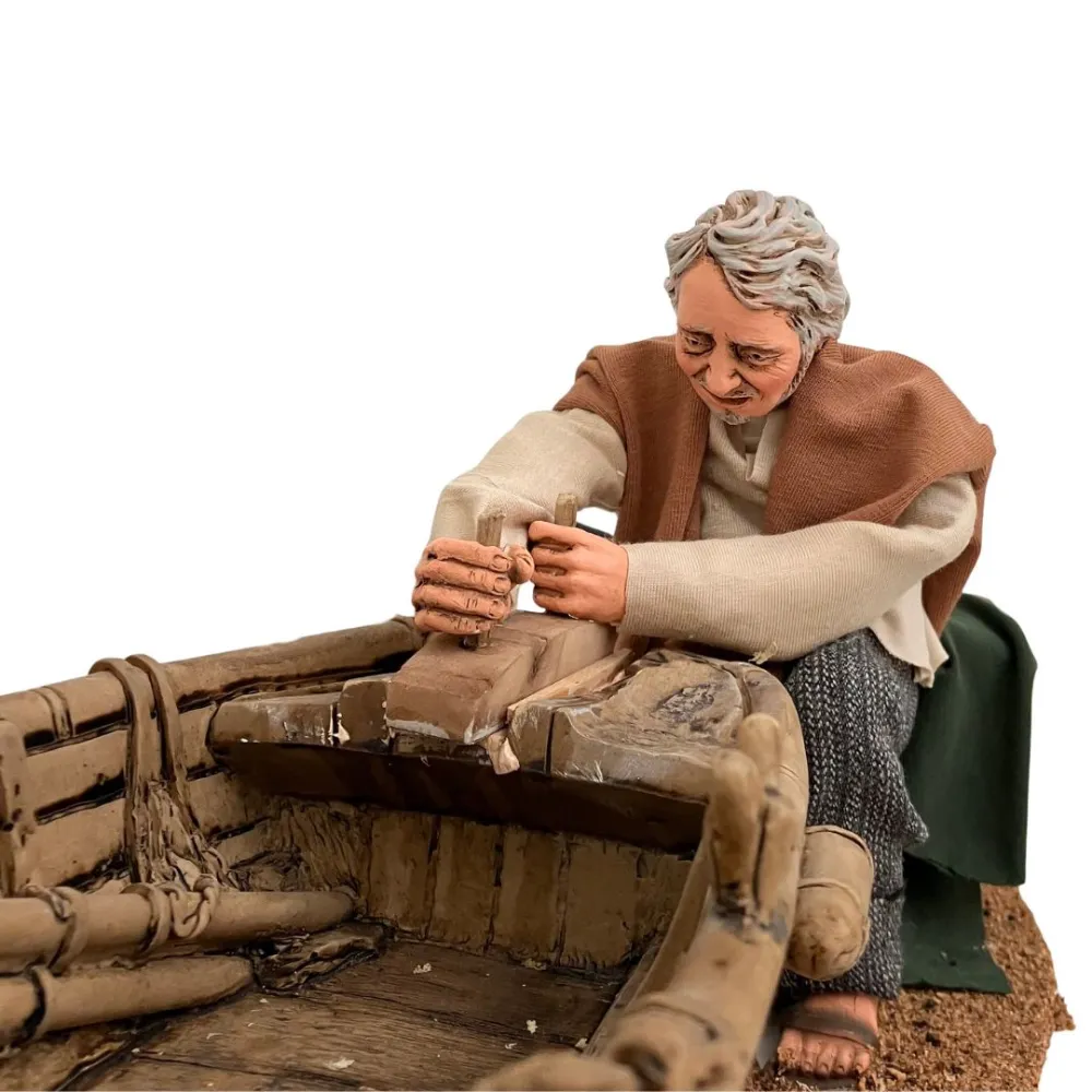 Animated Traditional Man Planing a Wooden Boat - 30 cm