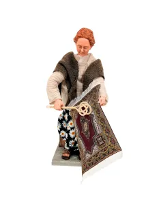 Donna che spolvera il tappeto popolare in movimento 30 cm 2