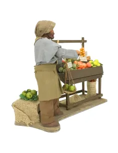 Fruttivendolo con banco e bilancia in terracotta in movimento 25 cm 2
