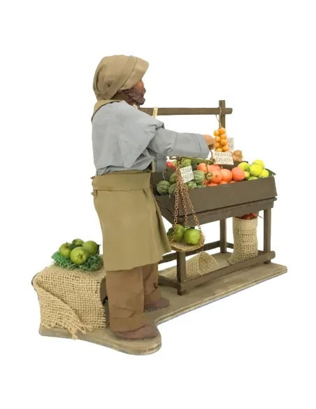 Fruttivendolo con banco e bilancia in terracotta in movimento 25 cm