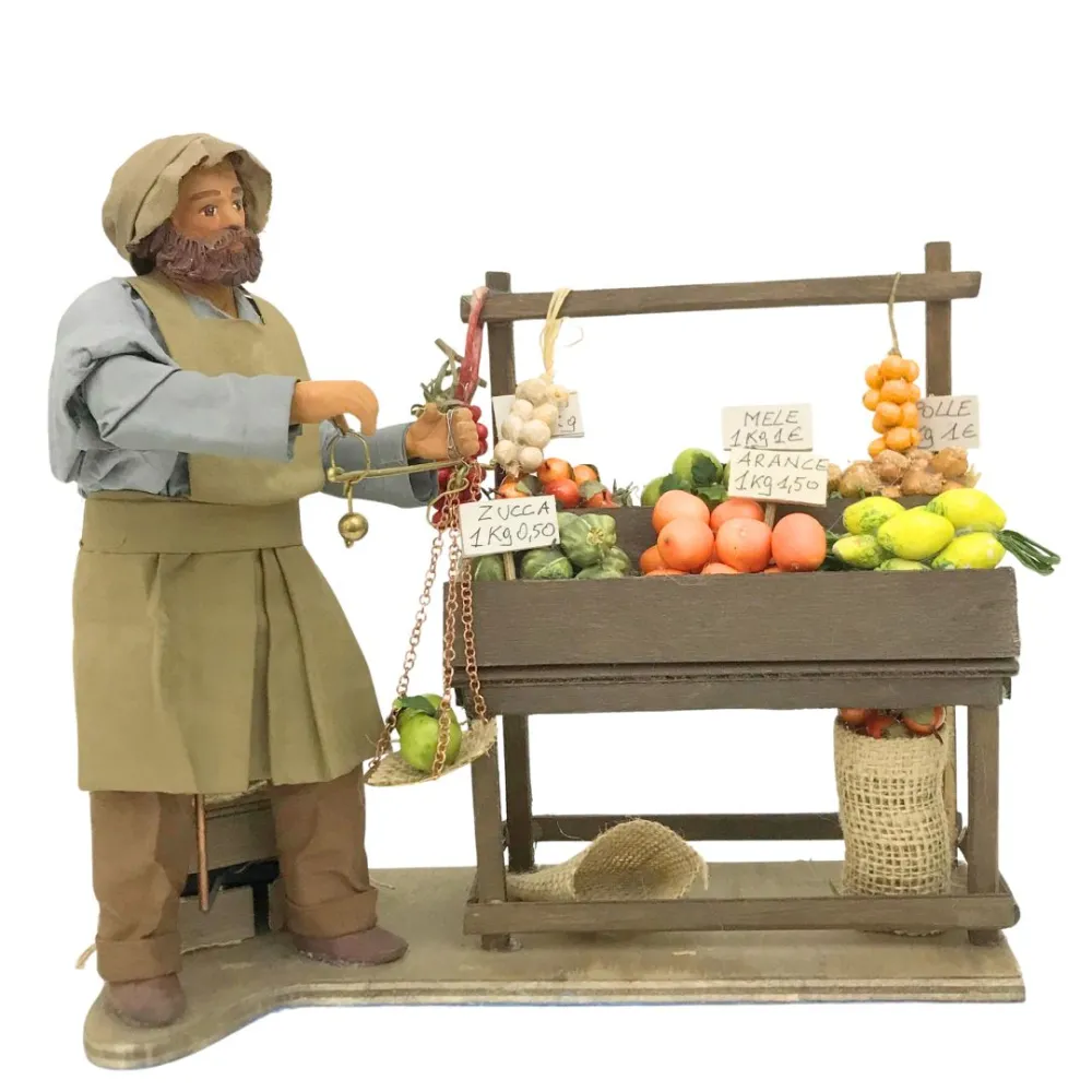 Fruttivendolo con banco e bilancia in terracotta in movimento 25 cm