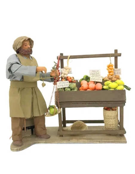 Fruttivendolo con banco e bilancia in terracotta in movimento 25 cm