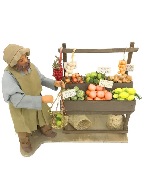 Fruttivendolo con banco e bilancia in terracotta in movimento 25 cm