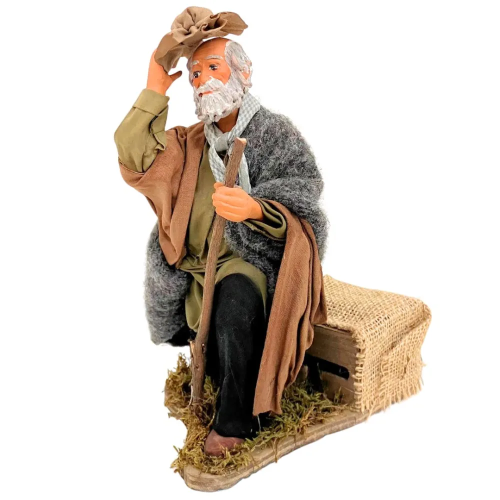 Animated Terracotta Kneeling Man with Hat - 25 cm