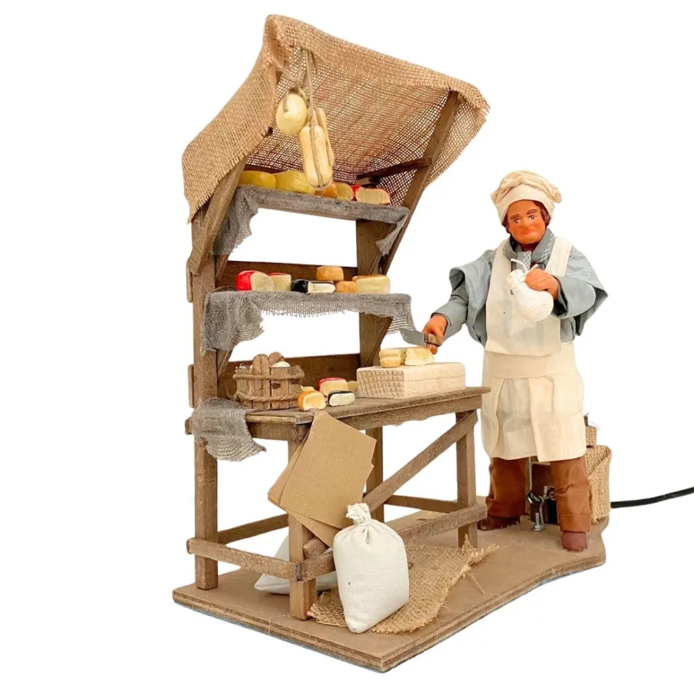 Venditore di formaggi in terracotta con banco in movimento 25 cm