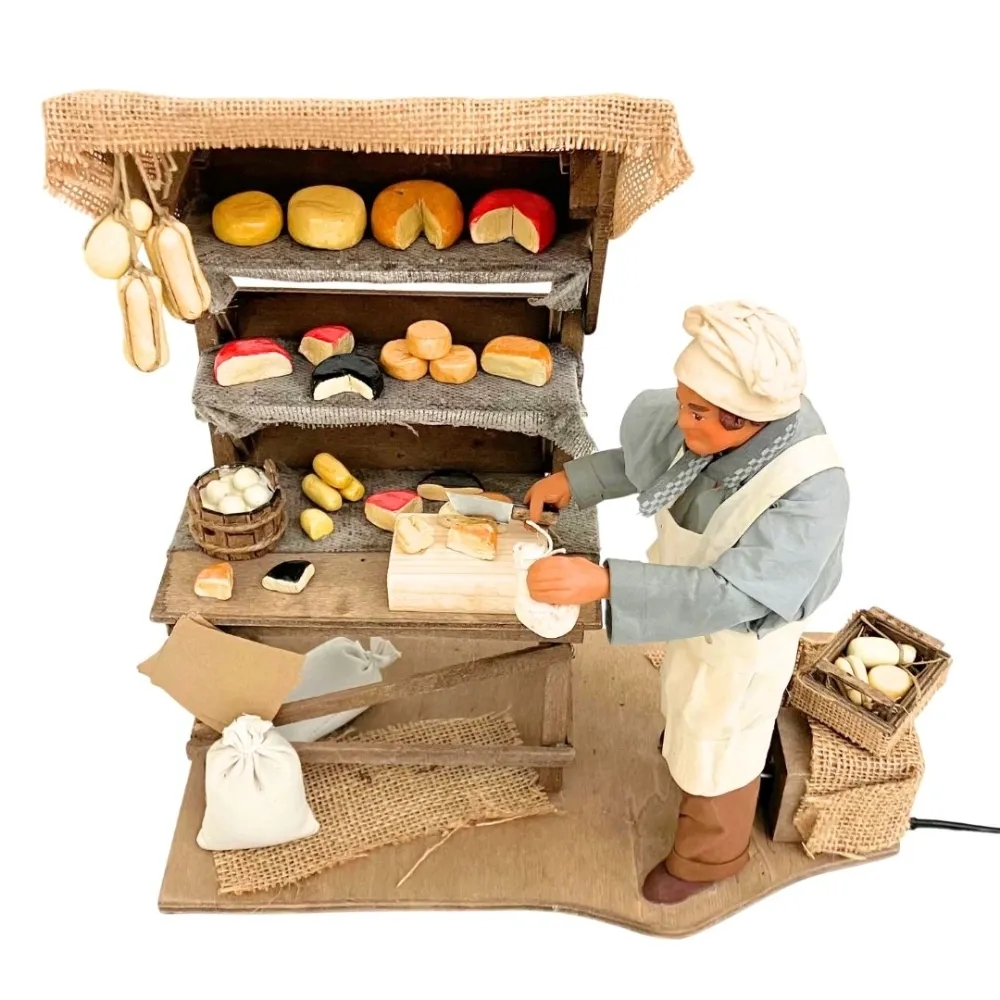 Venditore di formaggi in terracotta con banco in movimento 25 cm