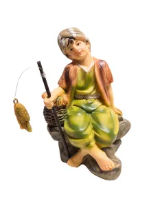 Giovane pescatore seduto serie 10 cm