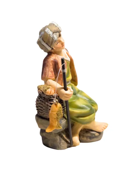 Giovane pescatore seduto serie 10 cm