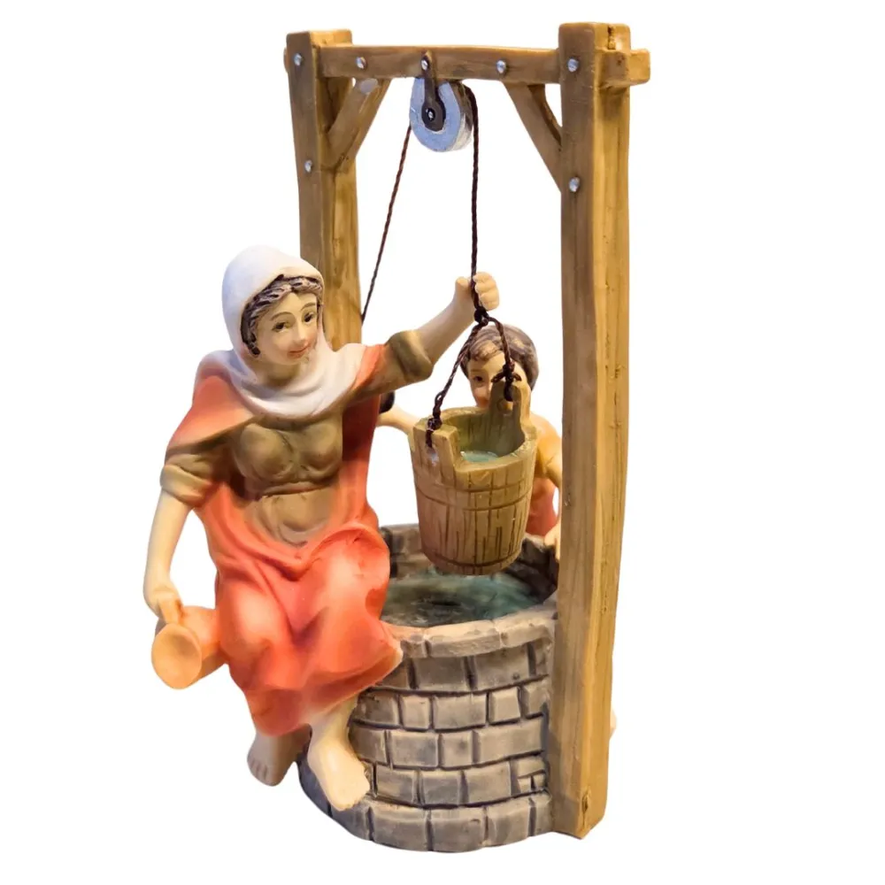 Scena donna al pozzo seduta con bambino serie 10 cm