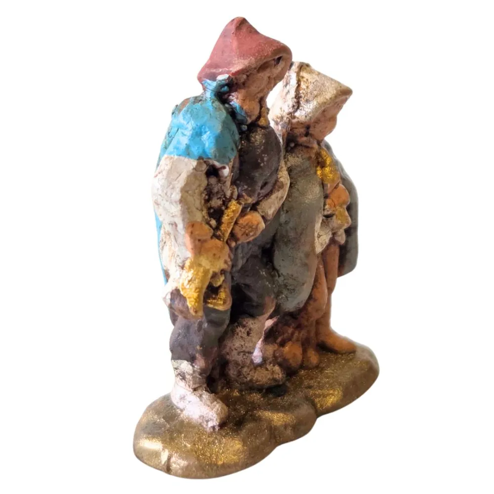 Terracotta bagpiper with child – 3 cm