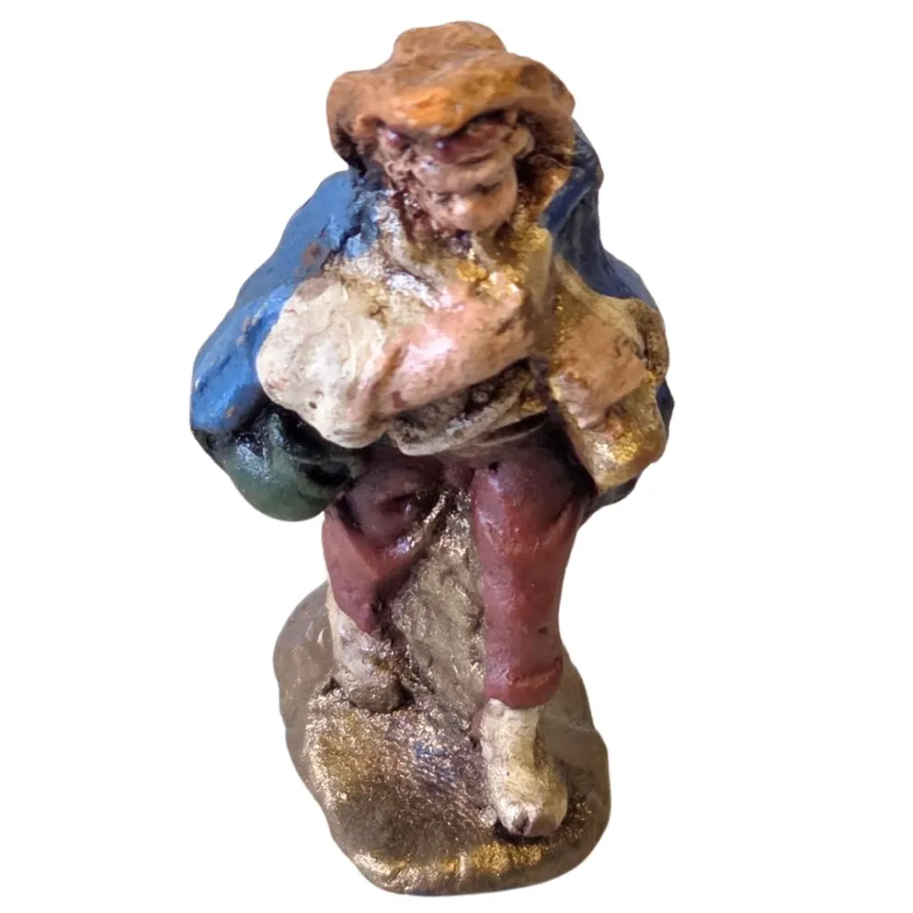Terracotta flute player – 3 cm