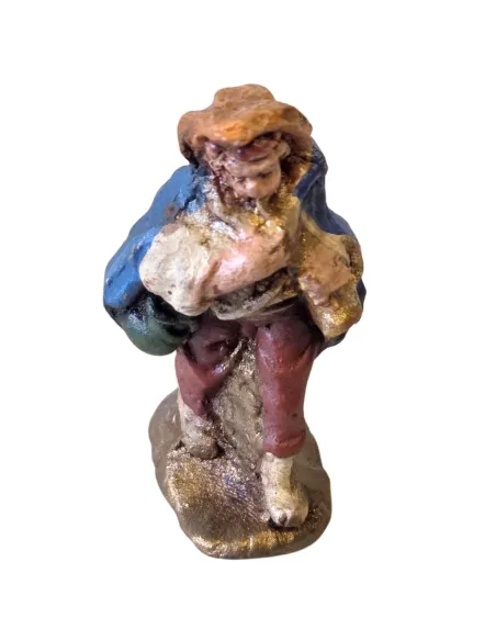 Terracotta flute player – 3 cm