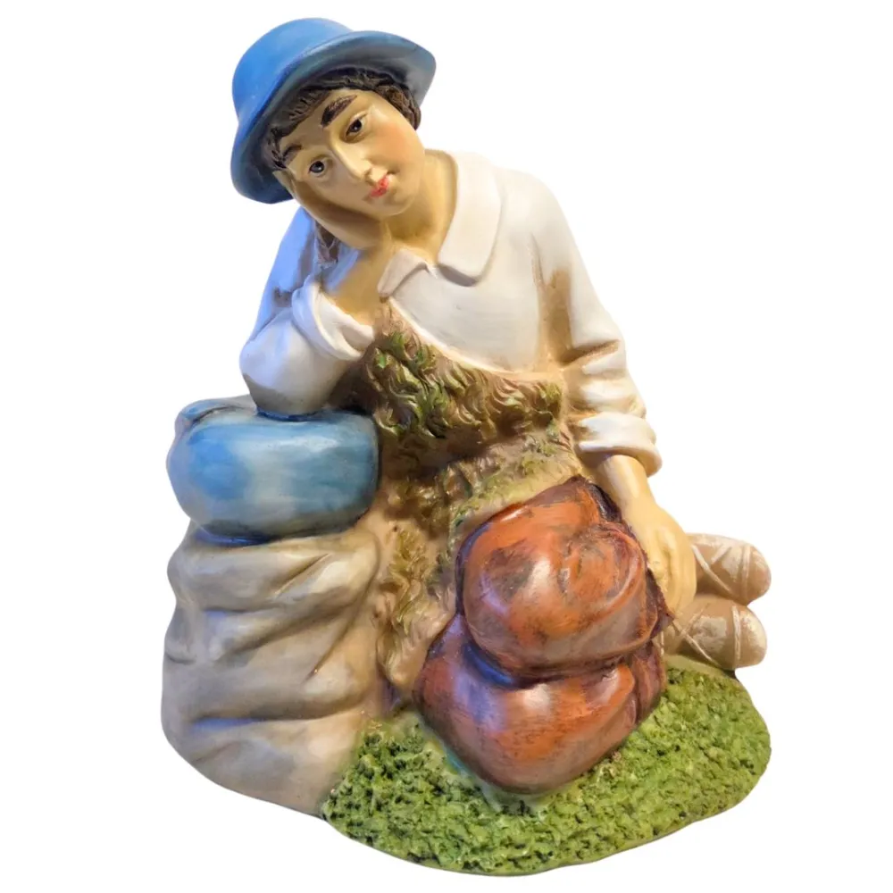 Resin resting shepherd – 30 cm