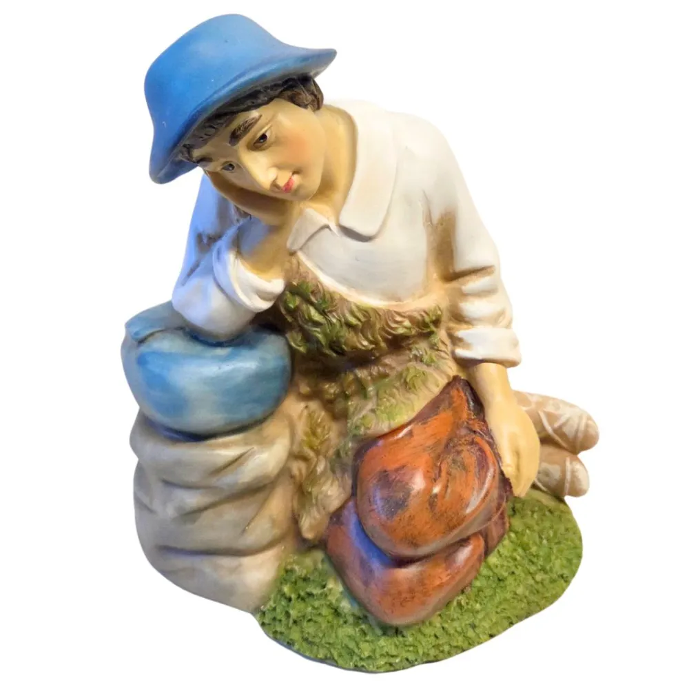 Resin resting shepherd – 30 cm