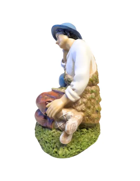 Resin resting shepherd – 30 cm