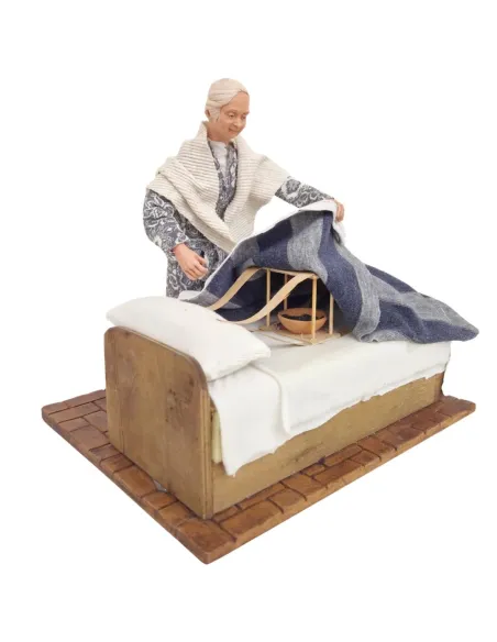 Animated Elderly Woman Warming a Heated Bed - 30 cm