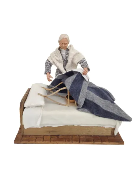 Animated Elderly Woman Warming a Heated Bed - 30 cm