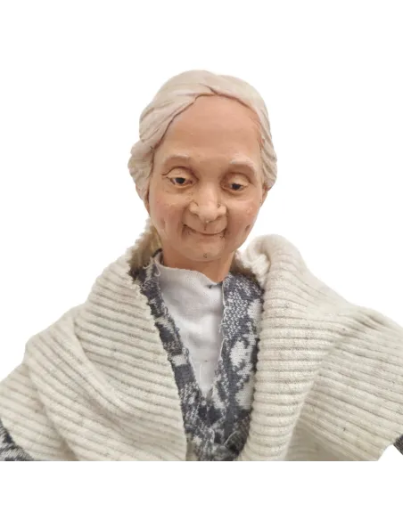 Animated Elderly Woman Warming a Heated Bed - 30 cm